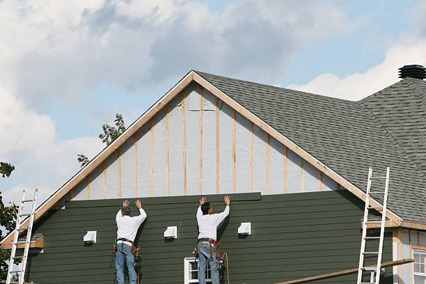 Professional Siding Contractor technician working in Arlington Heights, PA